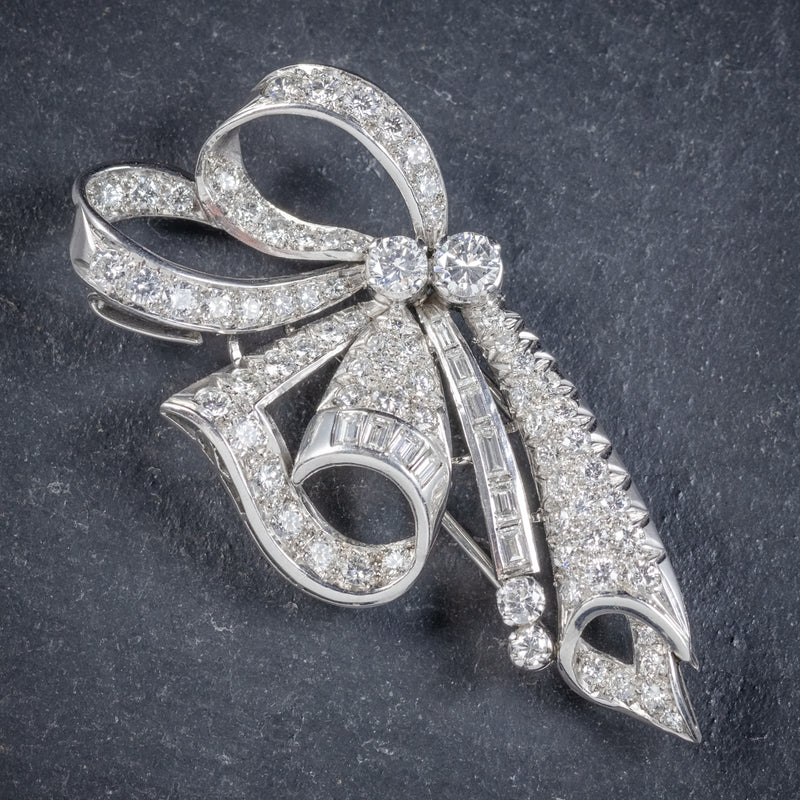 Brooch which can form double clips volute in platinum 85…